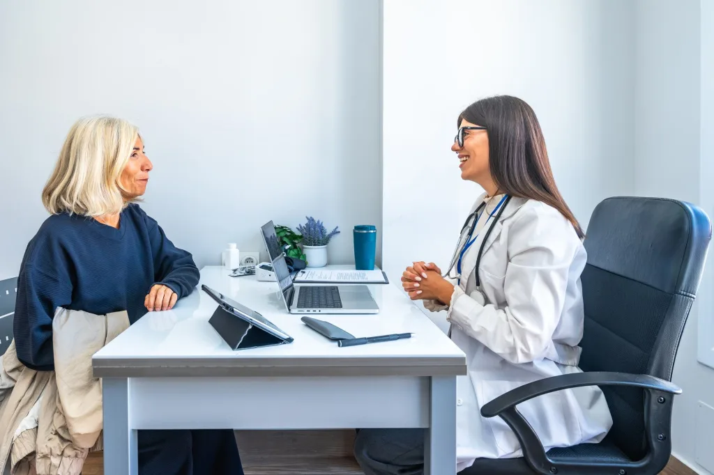 A doctor discussing treatment with a patient in a clinic